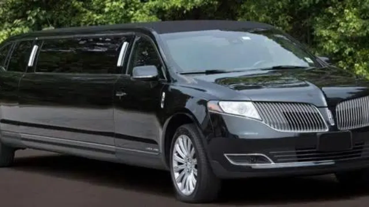 Kingston airport taxi MKT stretch limo in black shing color